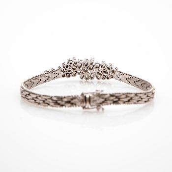 Bracelet, 18K white gold with cabochon-cut and brilliant-cut diamonds.