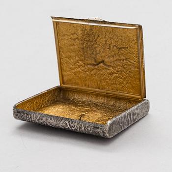 A Russian, early 20th century silver cigarette case, samorodok technique.