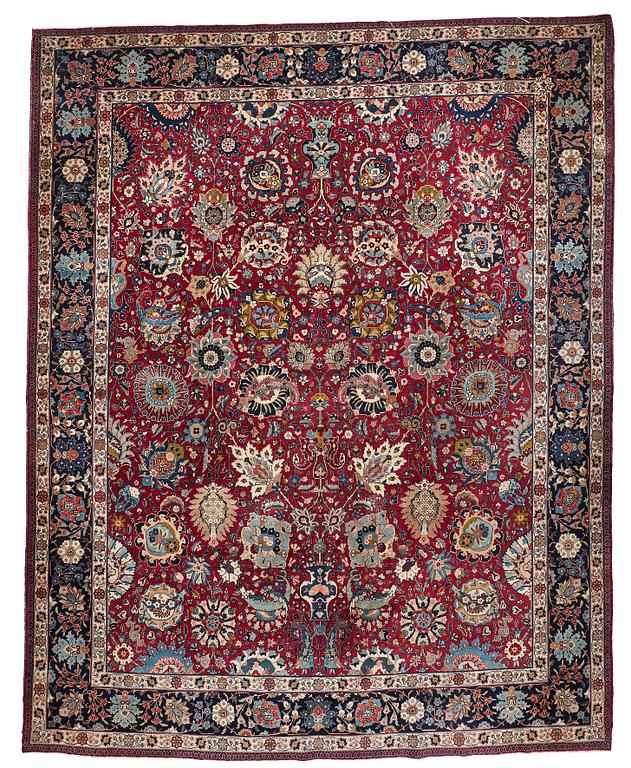 A carpet, semi-antique Tabriz, ca 413,5 x 328,5 cm.