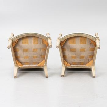 A pair of armchairs, Directoire, France, late 18th Century.