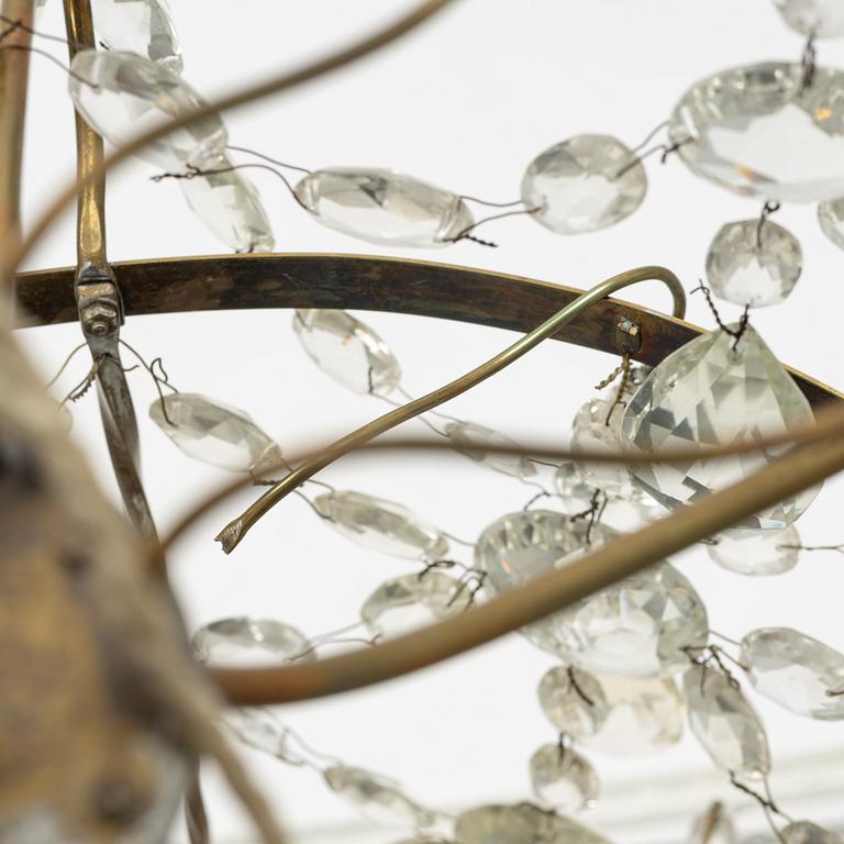 A three-light Gustavian-style hanging light, circa 1900.