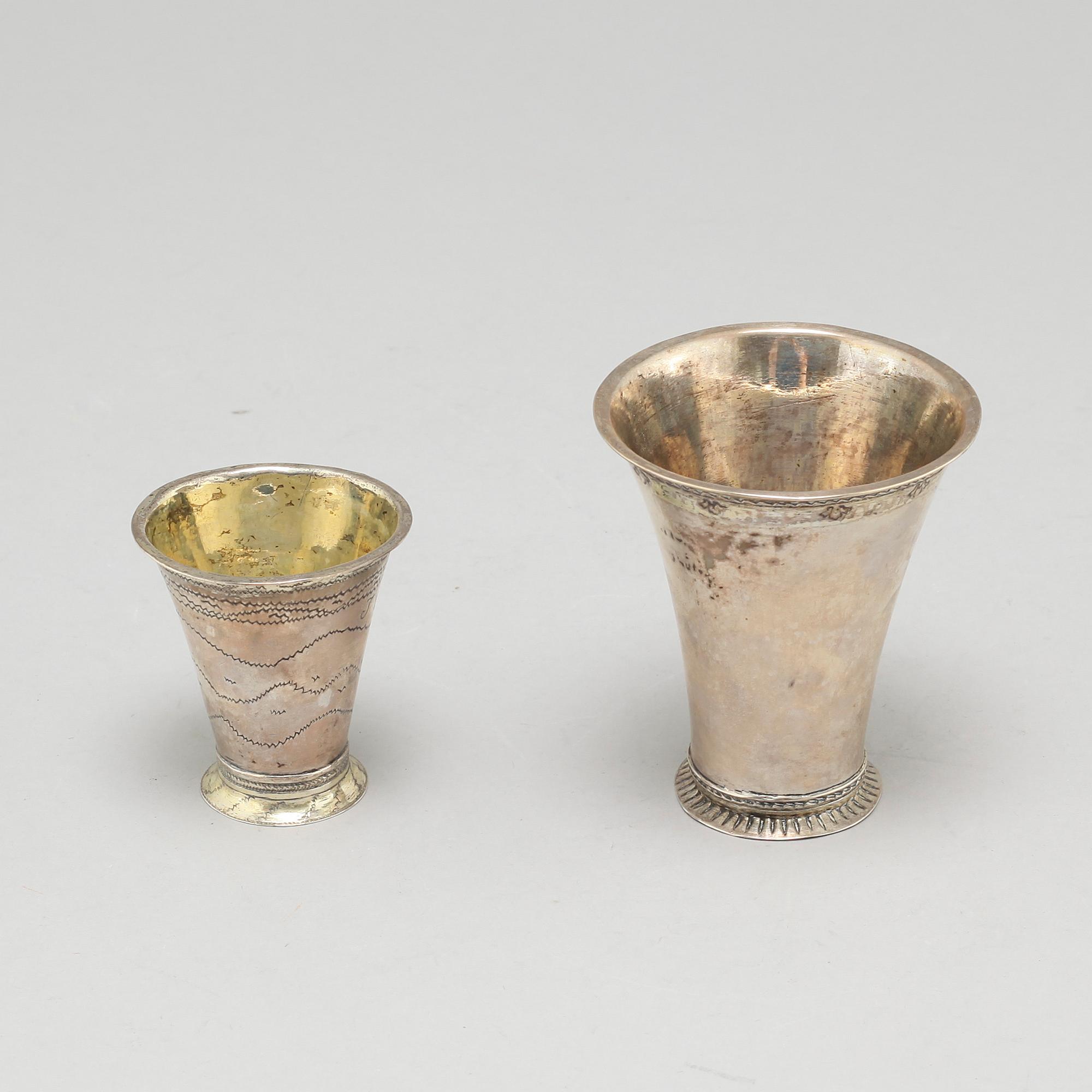 Two silver beakers by  Petter Sundelius, Visby (1785-1813) and Conrad Heitmüller, Nyköping, (1735-1779).