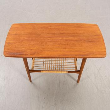A teak and rattan 1960s coffee table.