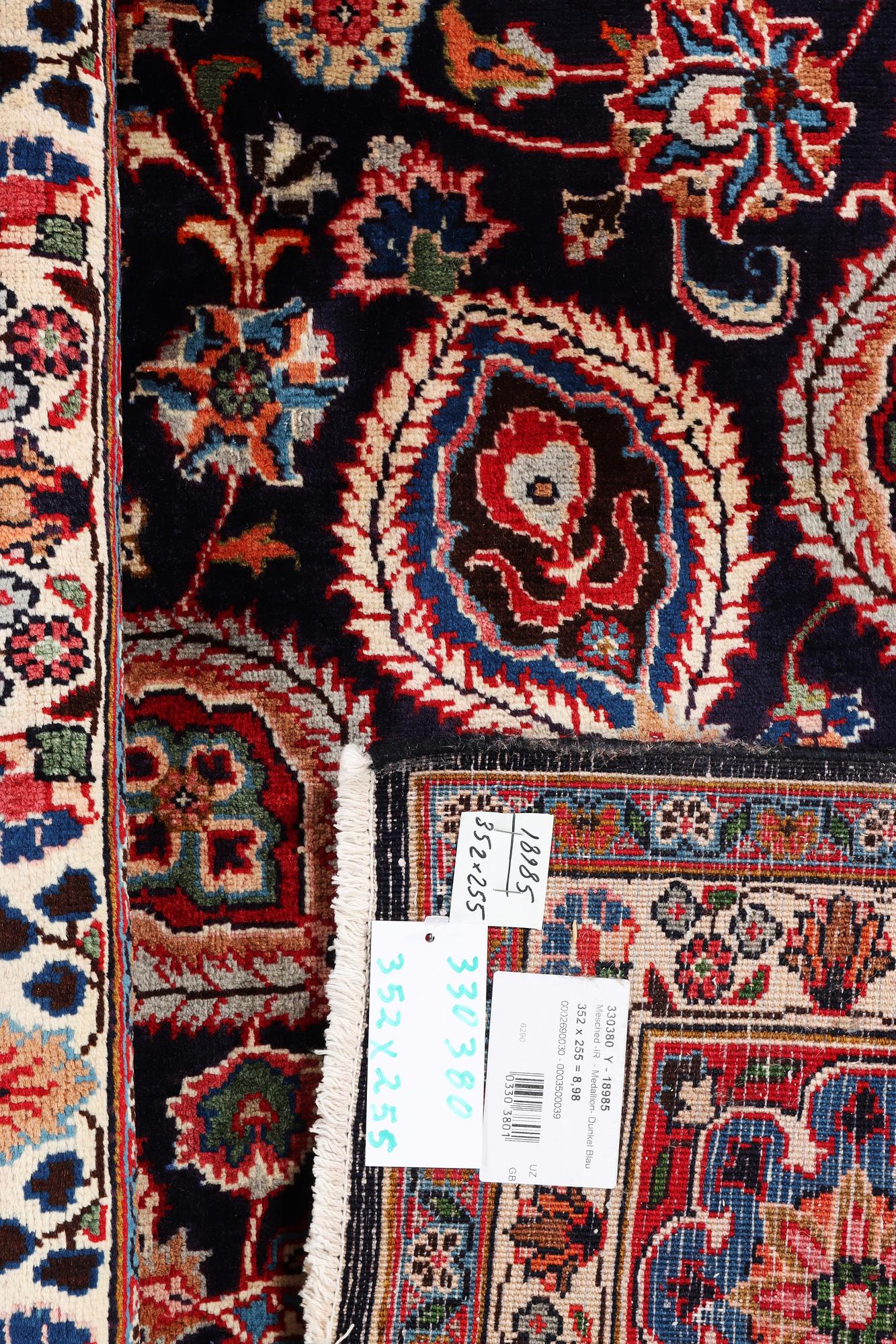 A Meshed carpet, c. 352 x 255 cm.