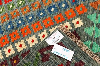 A Kilim rug, Afghanistan, c. 249 x 177 cm.