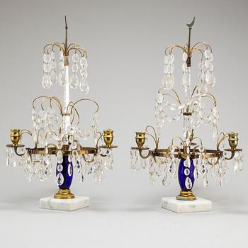 A pair of Gustavian style cut glass candlesticks, circa 1900.