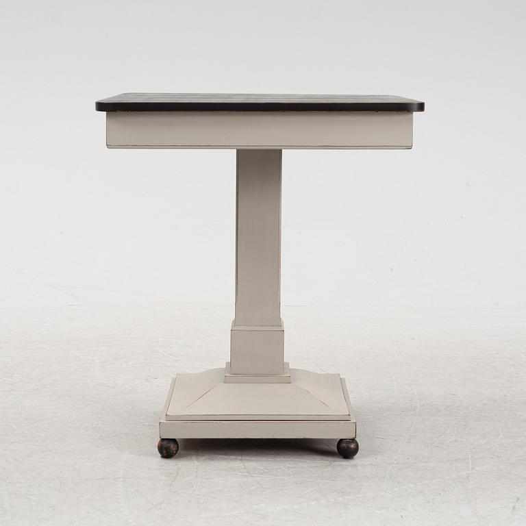 A painted table, early 20th Century.