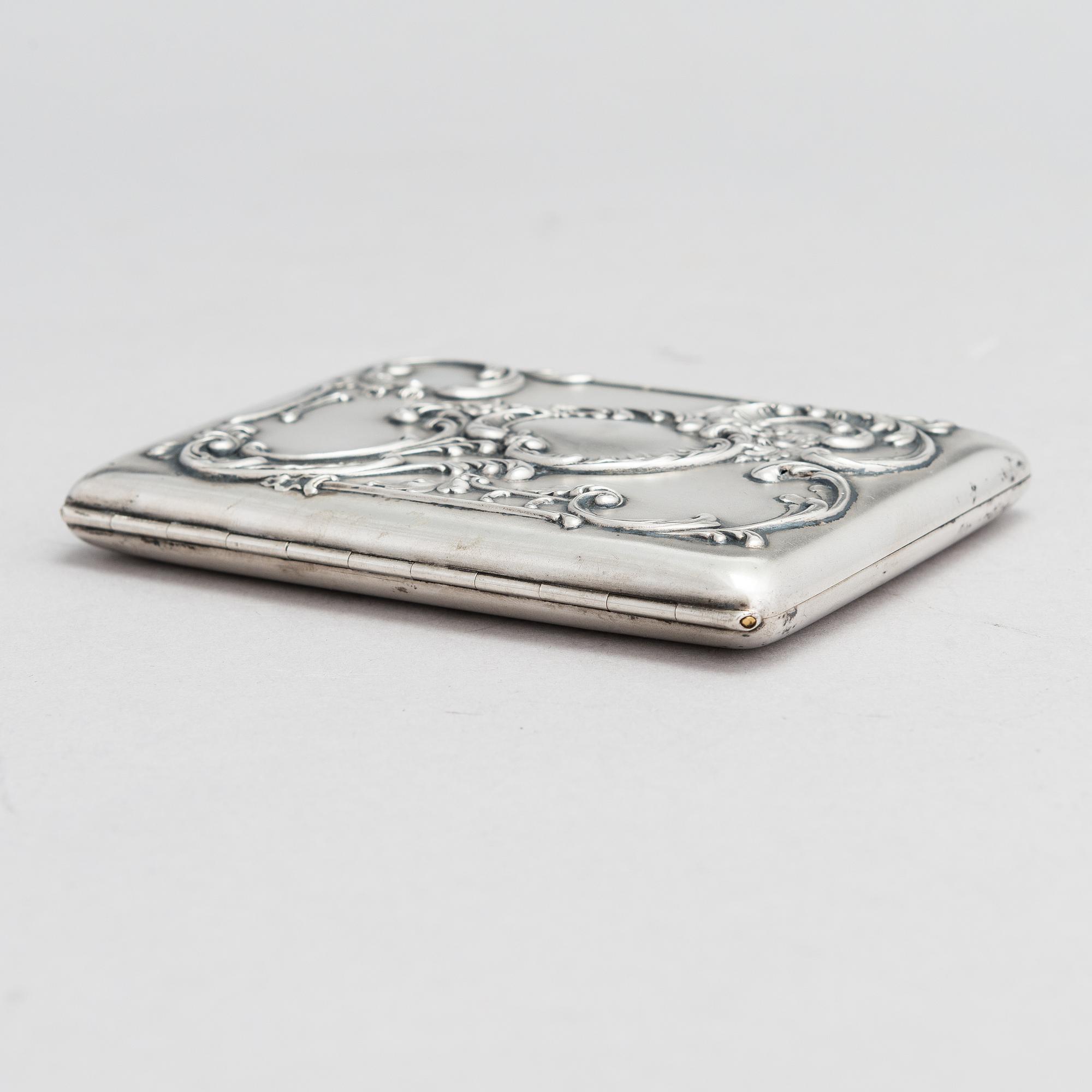 A Russian silver cigarette case, maker's mark of Mikhail Tarasov, Moscow 1908-14.
