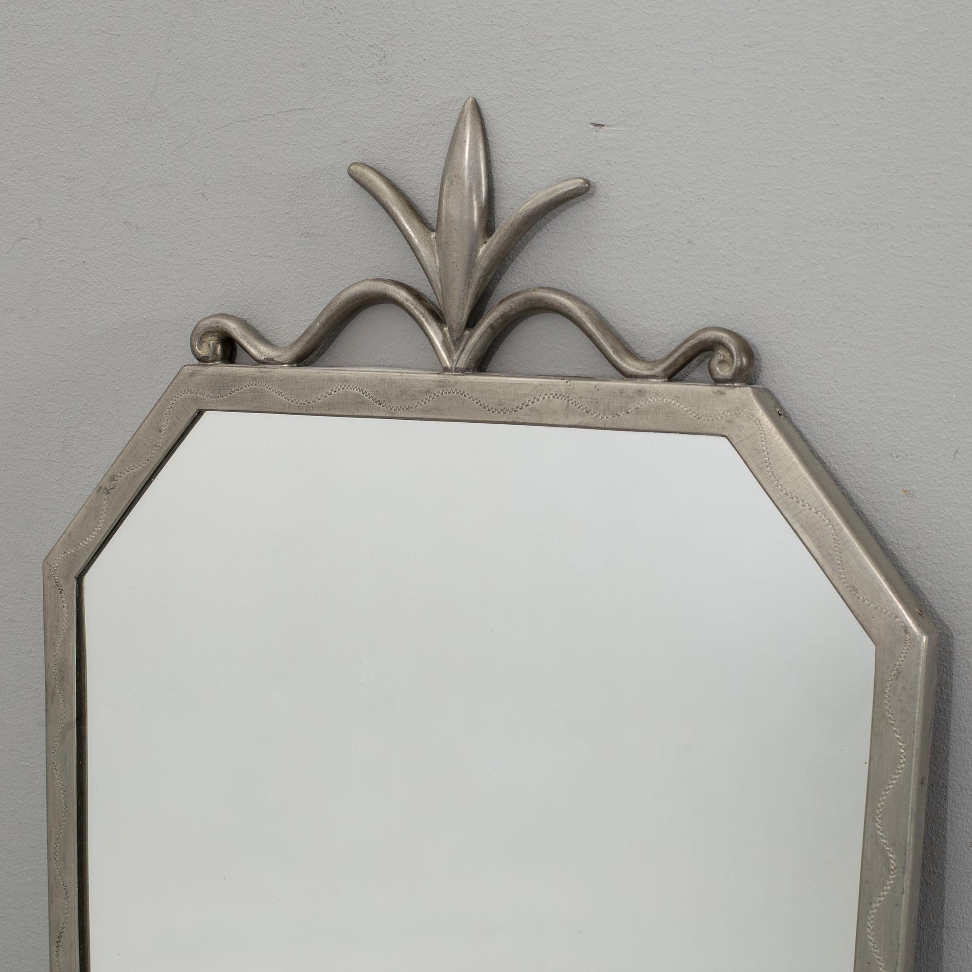 A PEWTER MIRROR, MID 20th CENTURY.