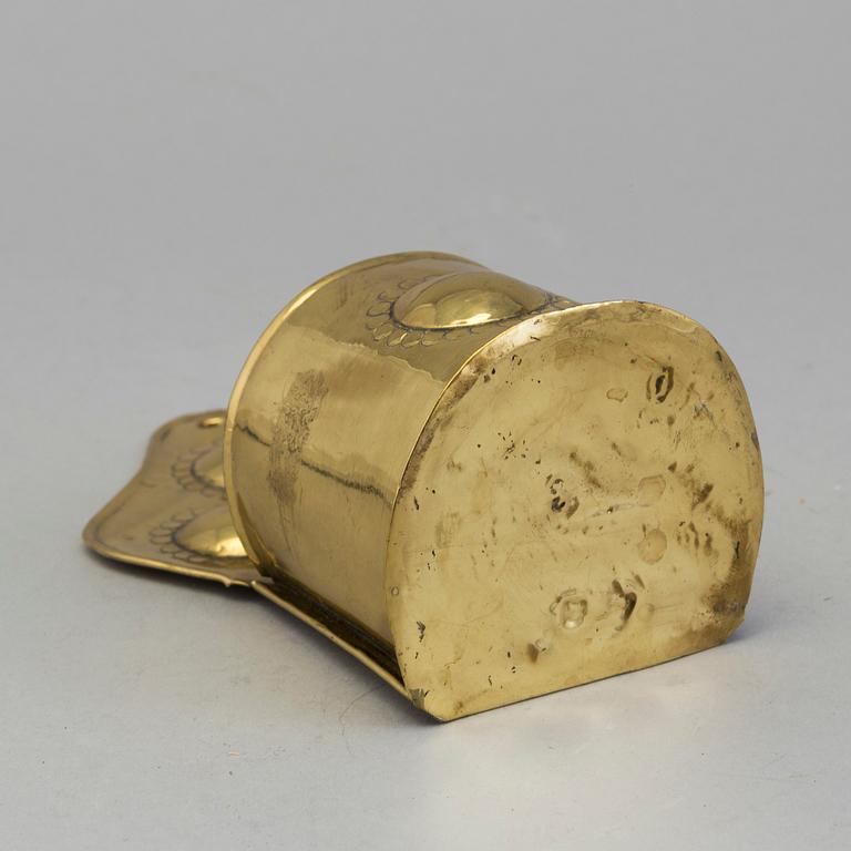 A 19th century brass spoon holder.