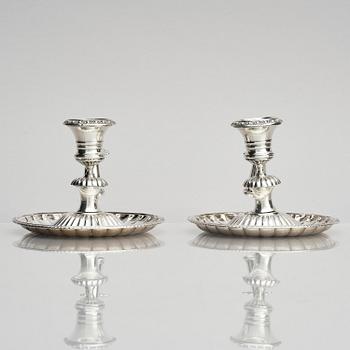 A pair of Swedish 19th century silver chamber-candlesticks, marks of Adolf Zethelius, Stockholm 1831.