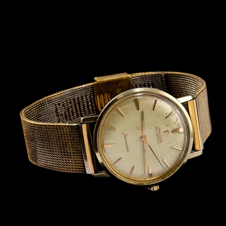 HERRARMBANDSUR, guld på stål, "seamaster", Omega. 1960-tal.