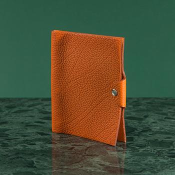 NOTEBOOK COVER by Hermès.