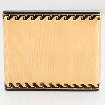 A Cartier Art Deco cigarett case in 18K gold with black enamel.