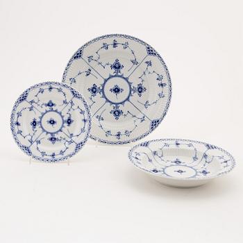 A 108 pice porcelain dinner and coffee service, 'Musselmalet', half and full lace, Royal Copenhagen.