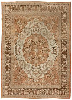 A CARPET. An antique Tabriz. 426 x 311 cm.