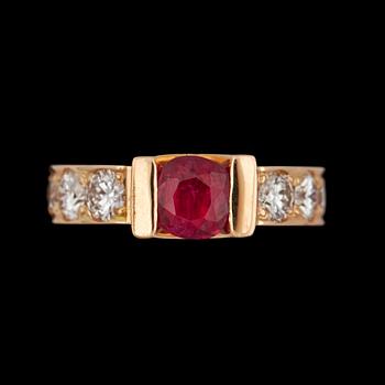 1054. A ruby and diamaond ring app. tot. 1 ct.