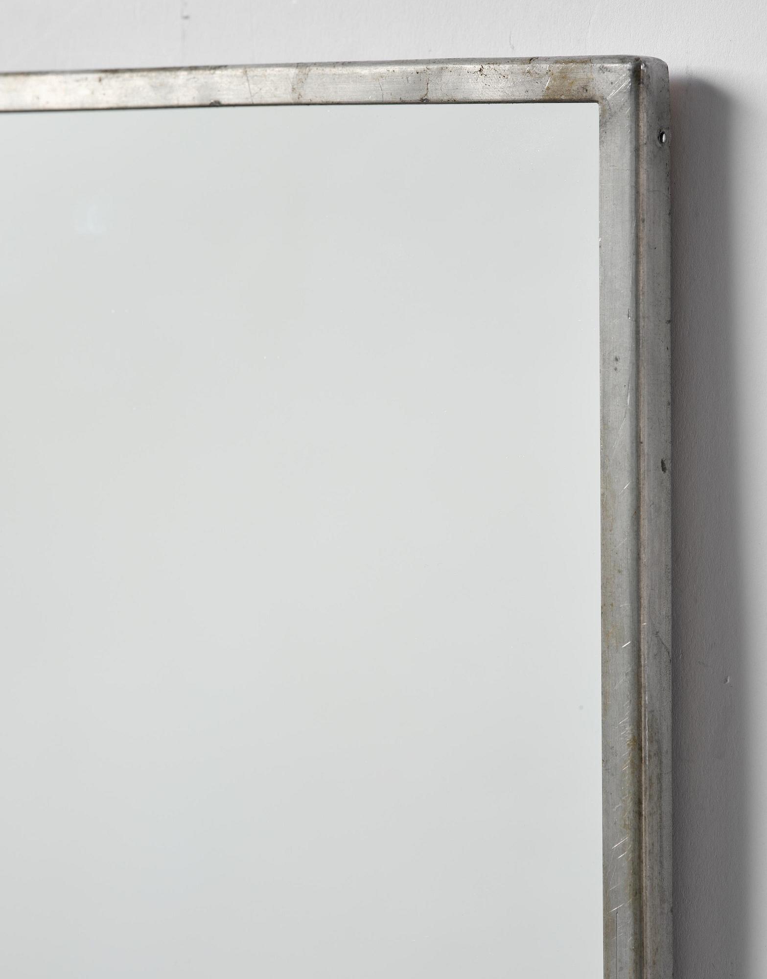 Firma Svenskt Tenn, a pewter wall mirror, Stockholm, 1935.