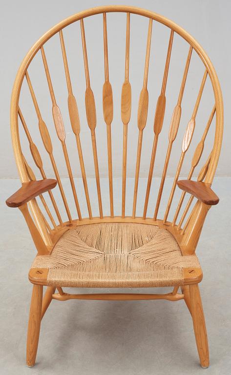 A Hans J Wegner ash and teak 'Peacock chair', Johannes Hansen, Denmark.