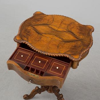 A mid 19th century sewing table.