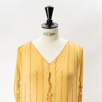 A 1920's pearl embroidered dress.