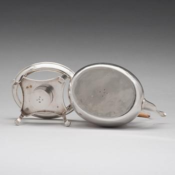 An English 18th century silver tea-pot and stand, mark of Andrew Fogelberg & Stephan Gilbert, London 1785.