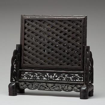 A Chinese bamboo panel, circa 1900.