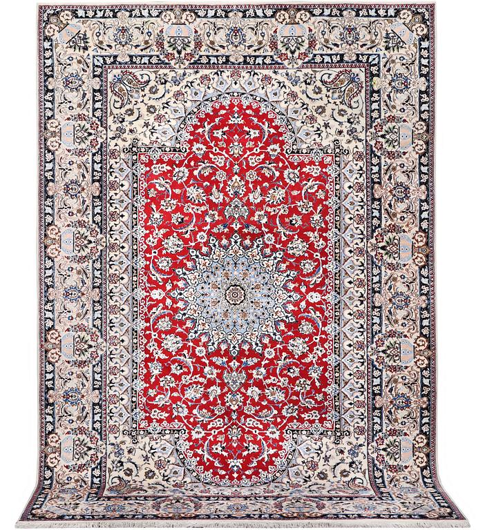 A Nain carpet, part silk, 6 laa, c. 303 x 184 cm.