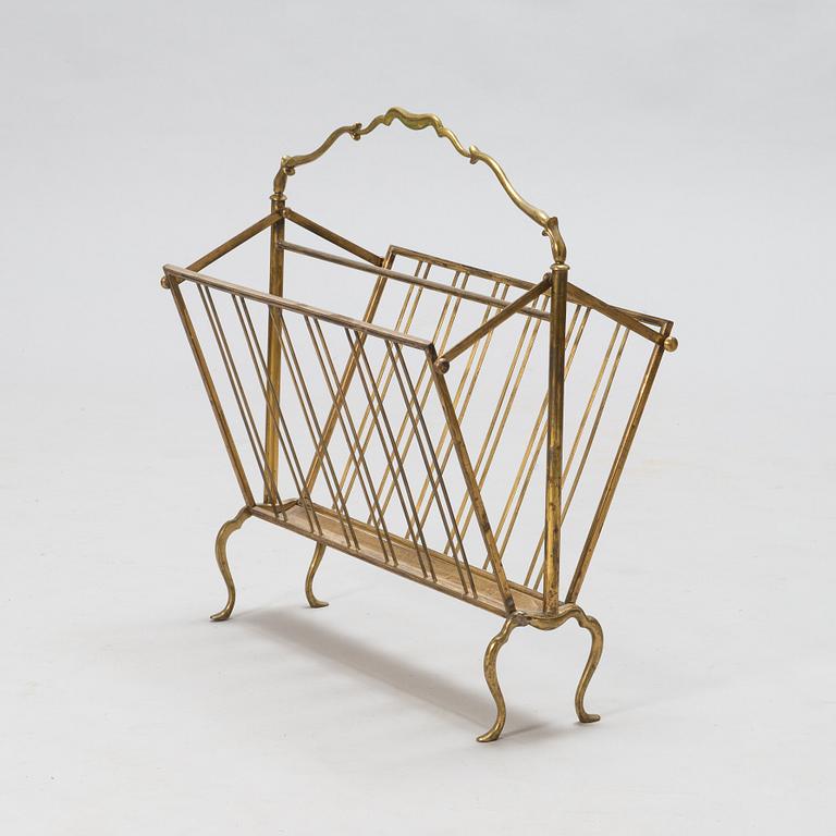 A folding brass magazine stand, first half of the 20th century.