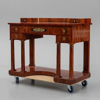 A mahogany console table, Stockholm, first half of the 19th century .