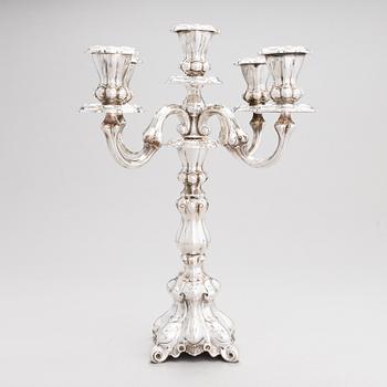 Kynttelikkö, hopeaa, Kultakeskus, Hämeenlinna 1987-88.