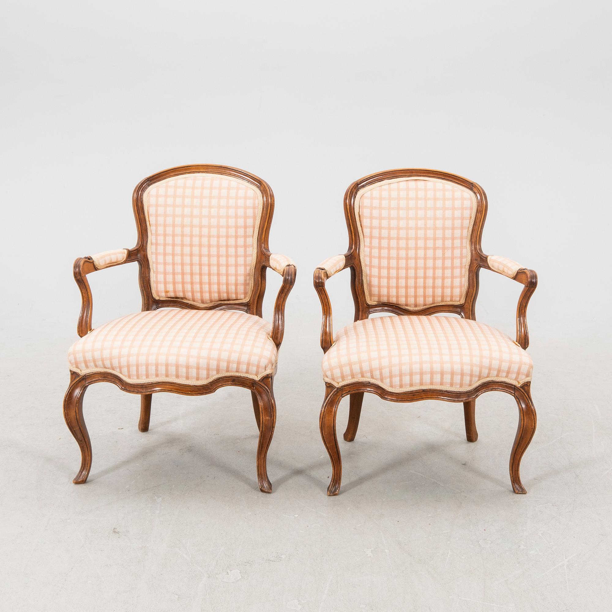 A pair of 19th century Rococo style armchairs.