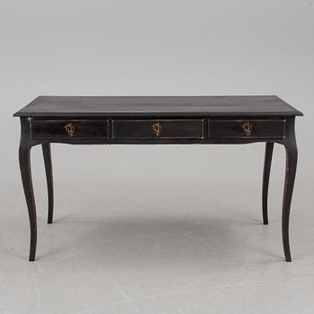 A partially rococo, 18th century writing desk.
