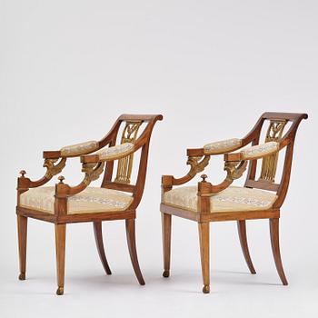 A pair of presumably Baltic empire mahogny armchairs.