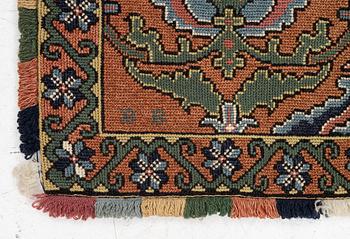 A sleigh cushion, signed BB and dated 1936, c. 160 x 67 cm.