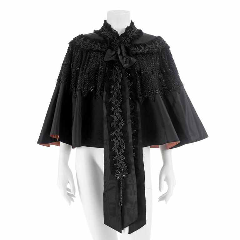 AUGUSTA LUNDIN, a blacke lce and beaded cape, early 20th century.