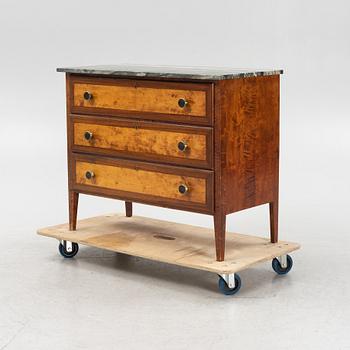 A mahogany and birch veneered dresser with a stone top.