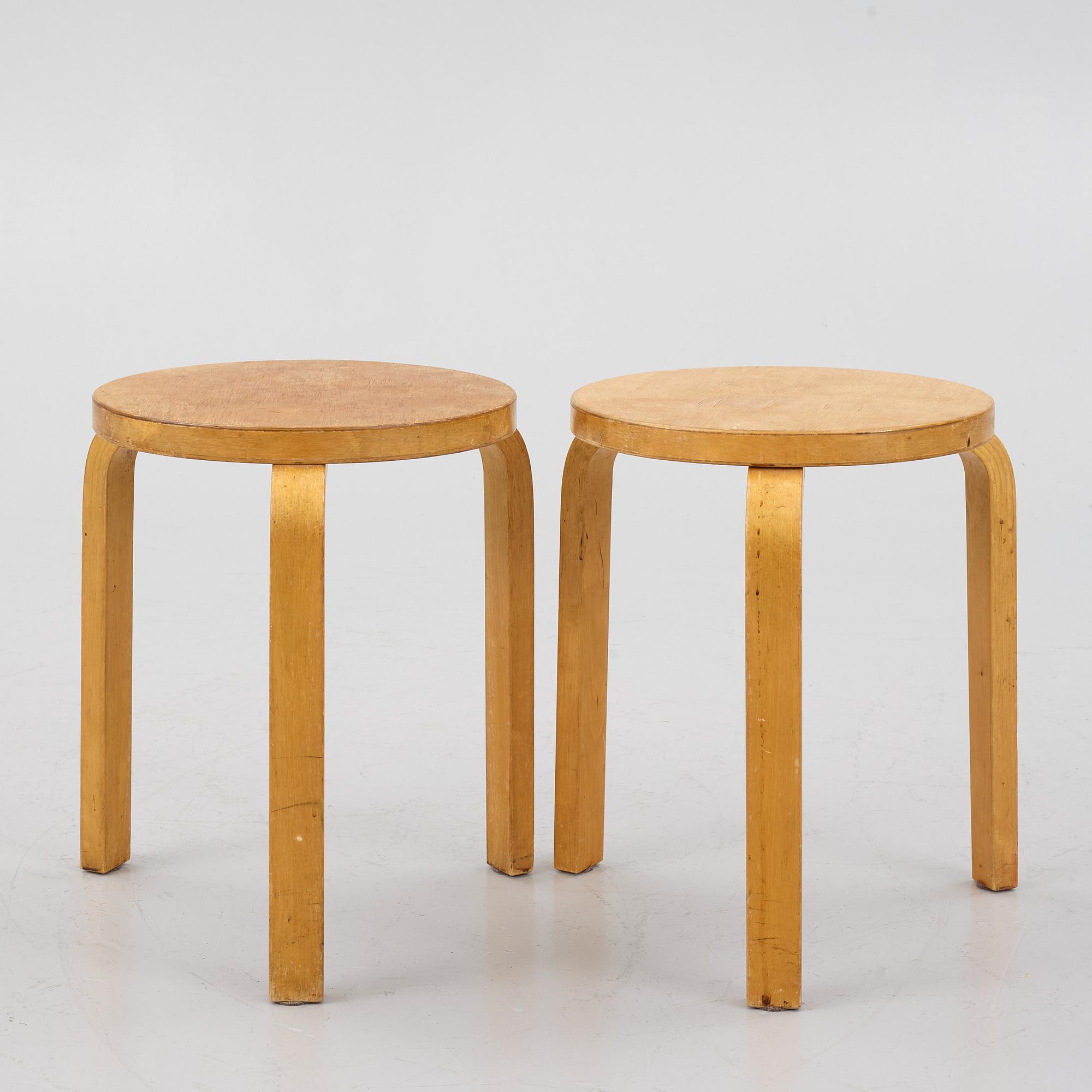 Alvar Aalto, a pair of model 60 stools, Artek, mid 20cth century.