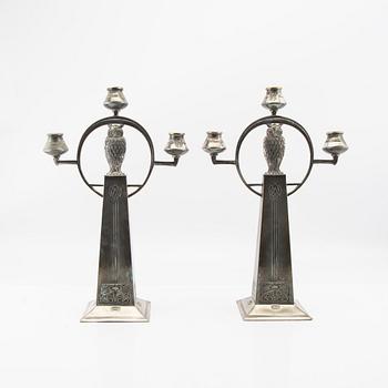 Candelabras, a pair by WMF (Württembergische Metallwarenfabrik), early 20th century, nickel silver.