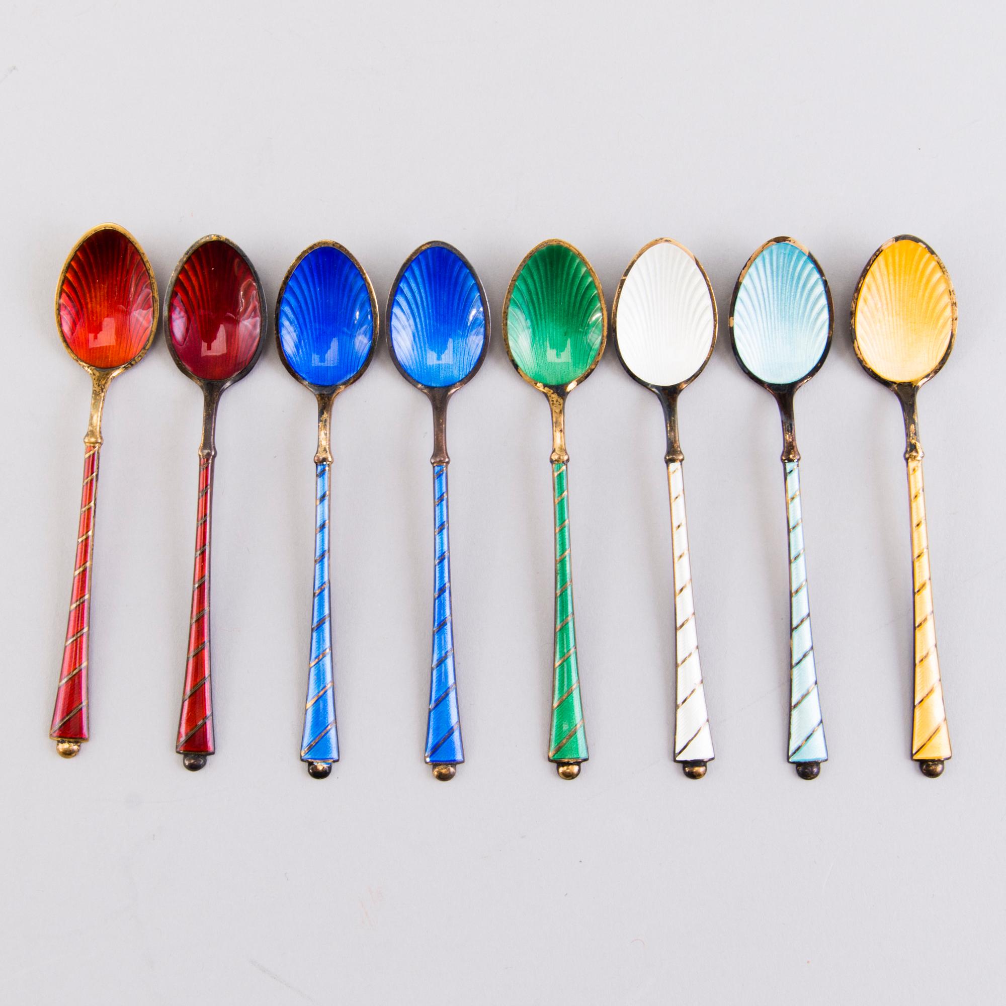 EGON LAURIDSEN, Eight parcel gilt and enamelled sterling silver coffee spoons, Copenhagen, Denmark.