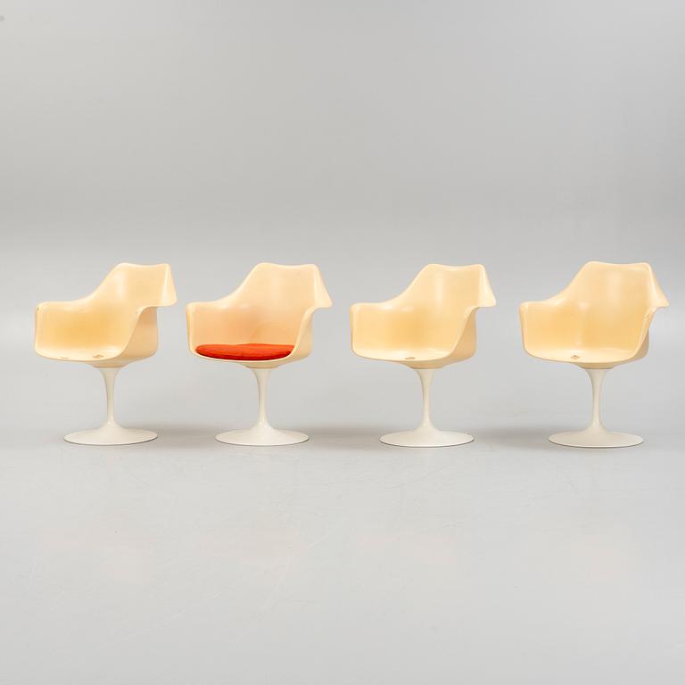 Eero Saarinen, four "Tulip" chairs, Knoll International, and a table.