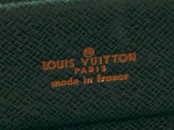 A 1990s naturel cowhide leather brief cse by Louis Vuitton.