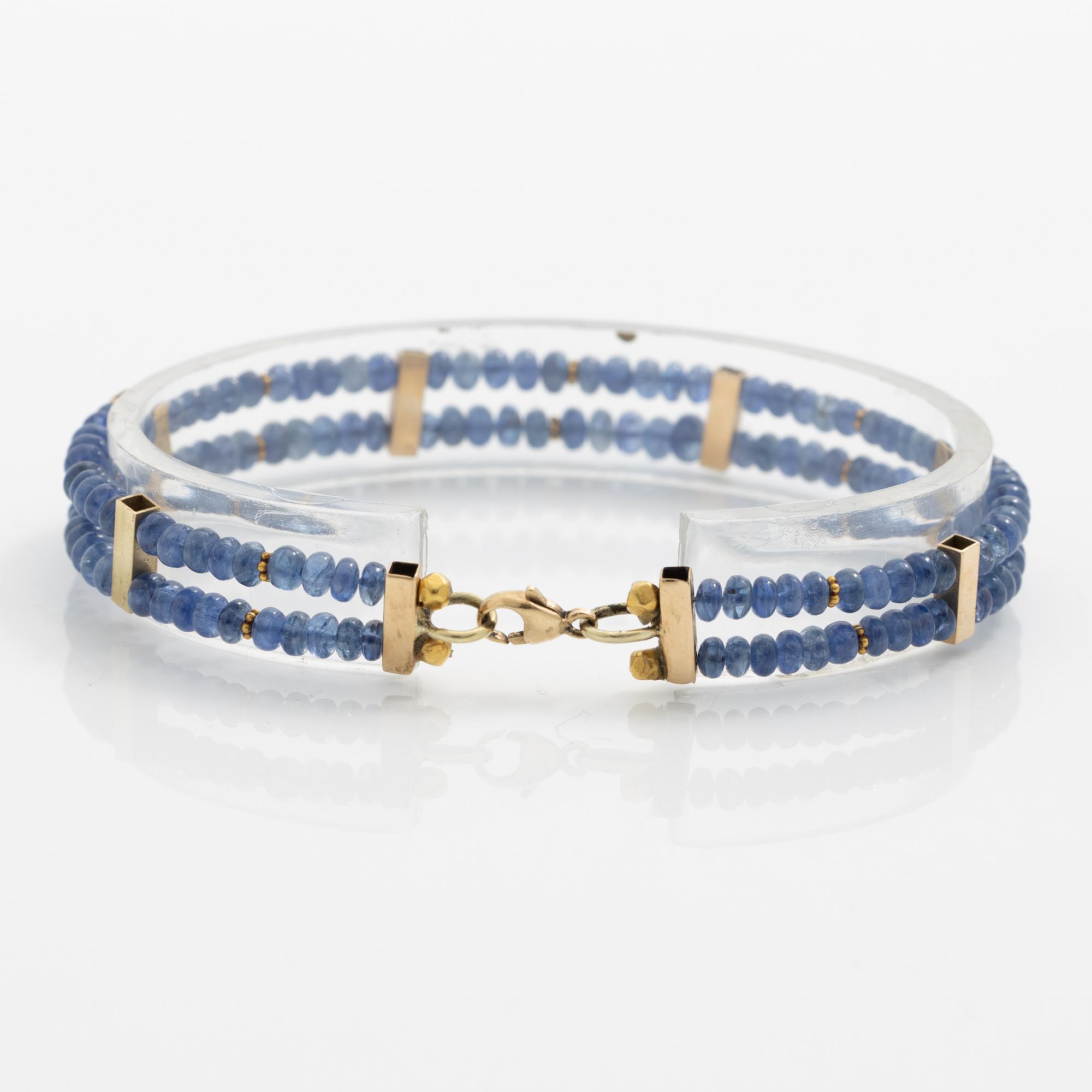 Bracelet, 14K gold with two rows of sapphires.