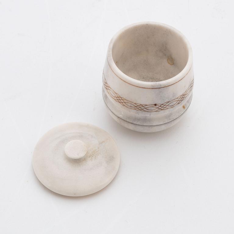 A small jar with lid made of engraved reindeer horn, by Bertil Fällman dated 98.