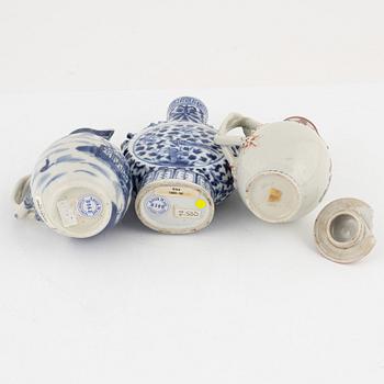 A blue and white moon flask and two creamers, porcelain, China, 18th-19th century.