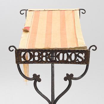 An iron book stand early 20th Century.