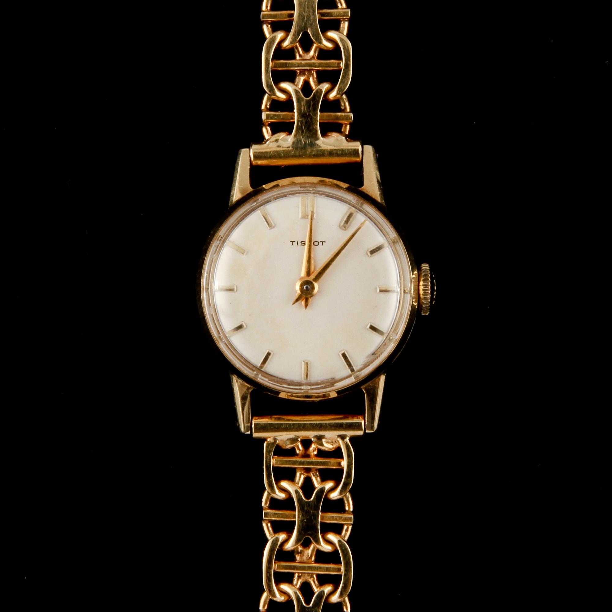 ARMBANDSUR, dam, 18 k guld, Tissot, 1960-tal, total vikt 23 g.