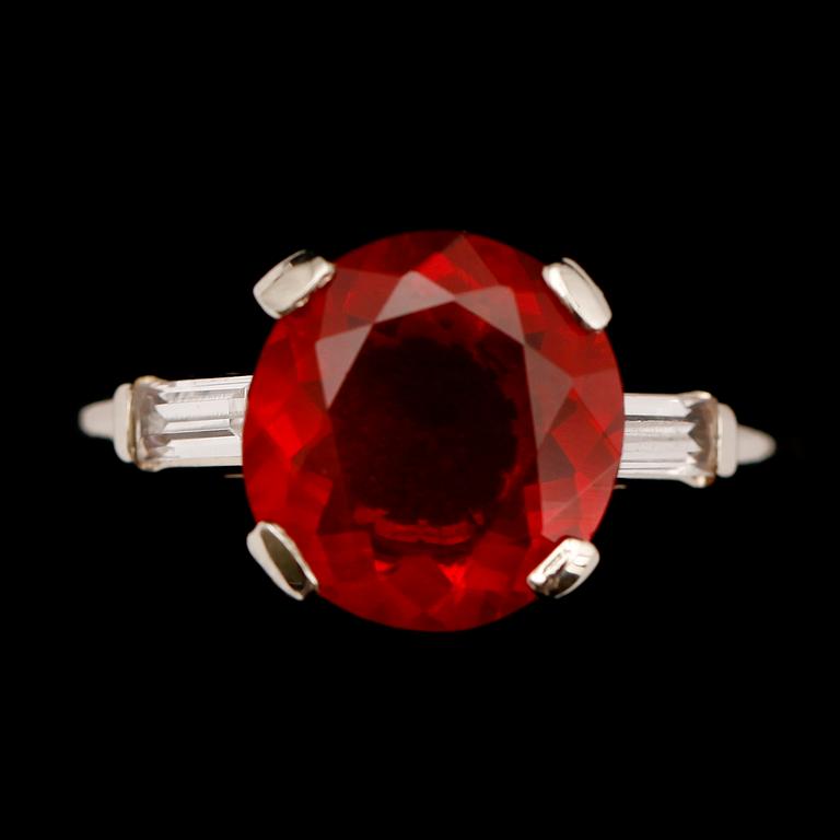 RING, 14 k, orange/röd eldopal 2.4 ct.