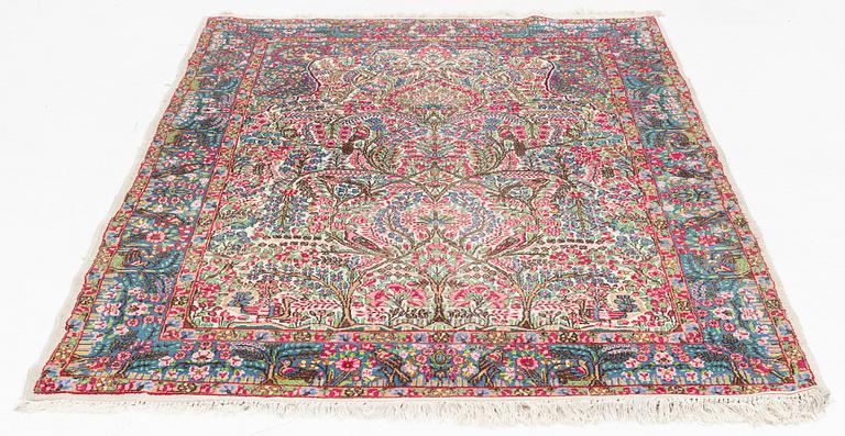 A semi-antique 'Millefleur' Kerman, ca ca 245 x 148 cm.
