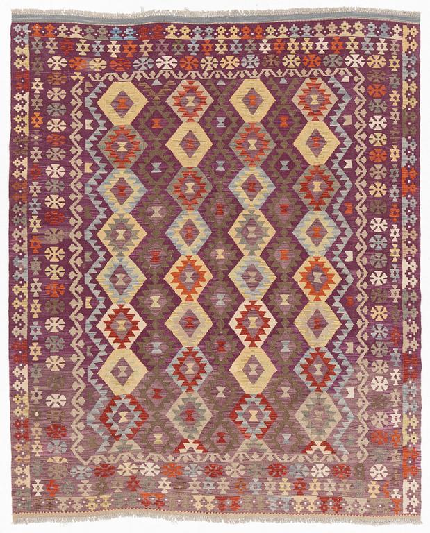 A Kilim rug, c. 245 x 205 cm.